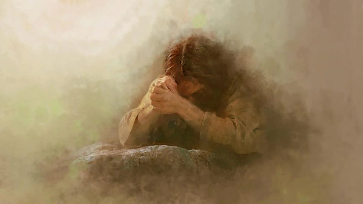 Christ praying with head bowed