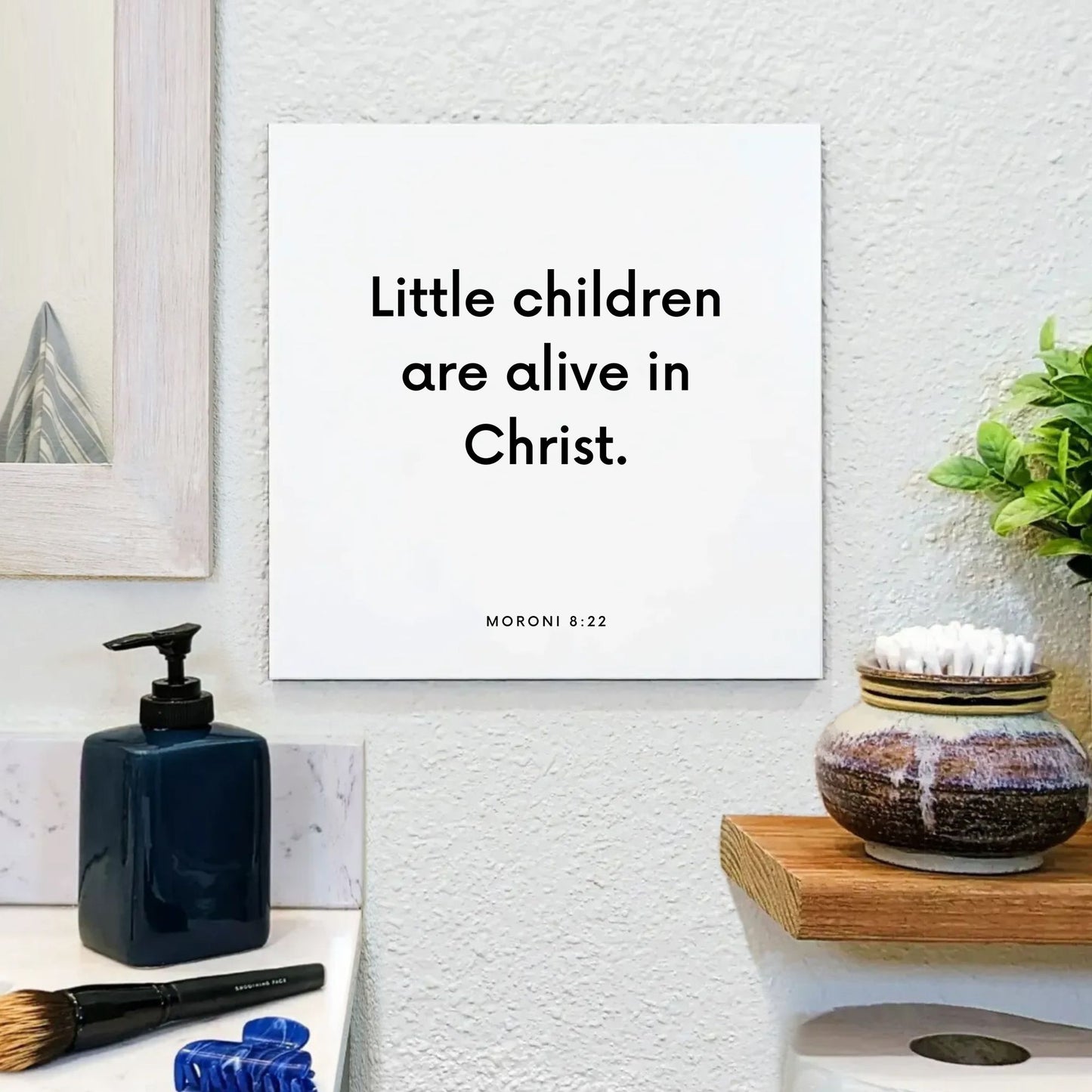 Bathroom mouting of the scripture tile for Moroni 8:22 - "Little children are alive in Christ"