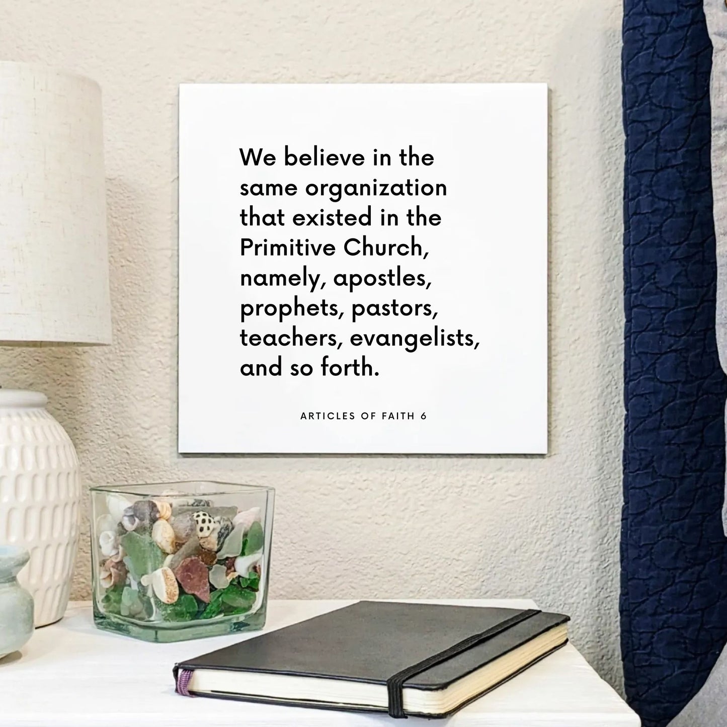 Bedside mouting of the scripture tile for Articles of Faith 6 - "We believe in the same organization"