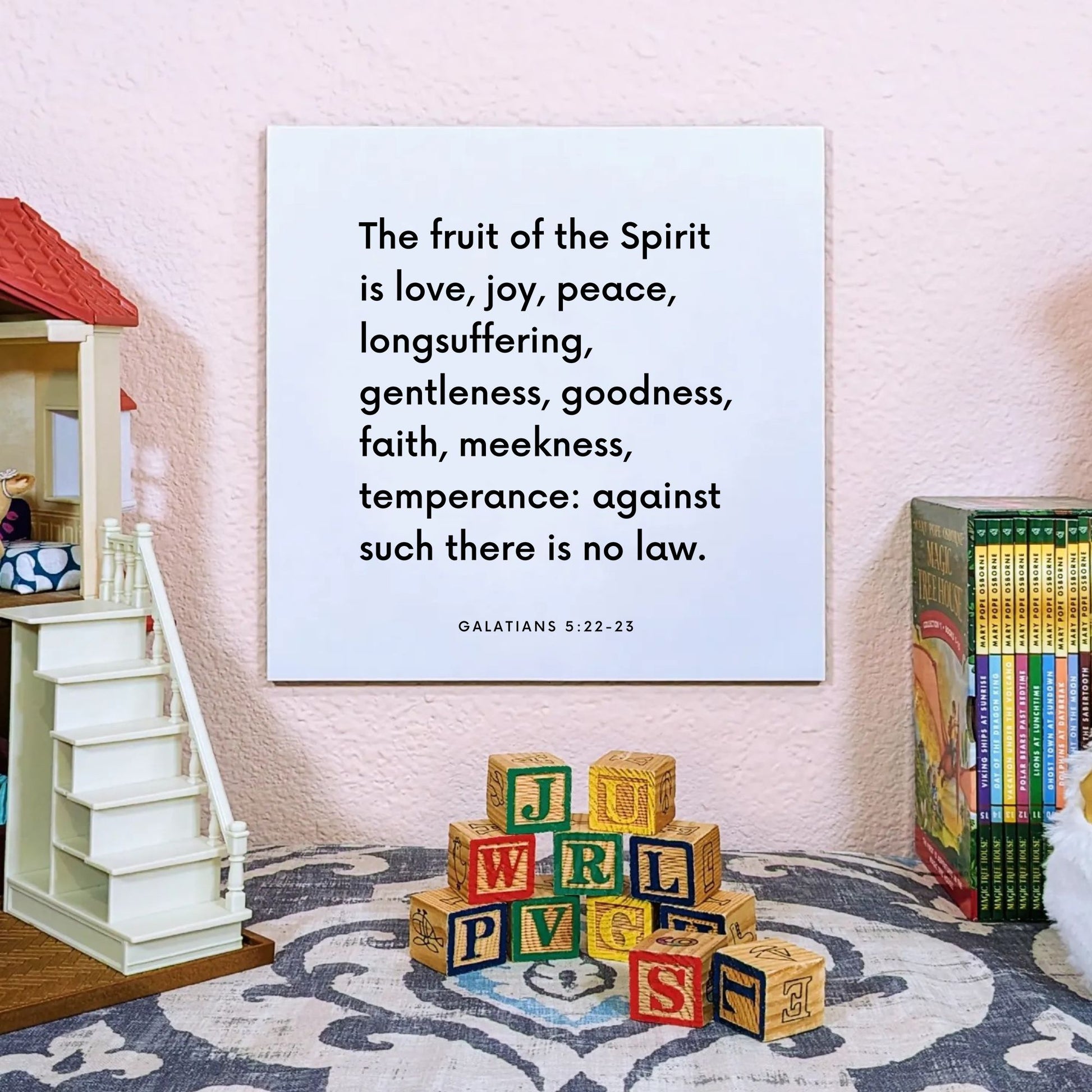 Playroom mouting of the scripture tile for Galatians 5:22-23 - "The fruit of the Spirit is love, joy, peace"