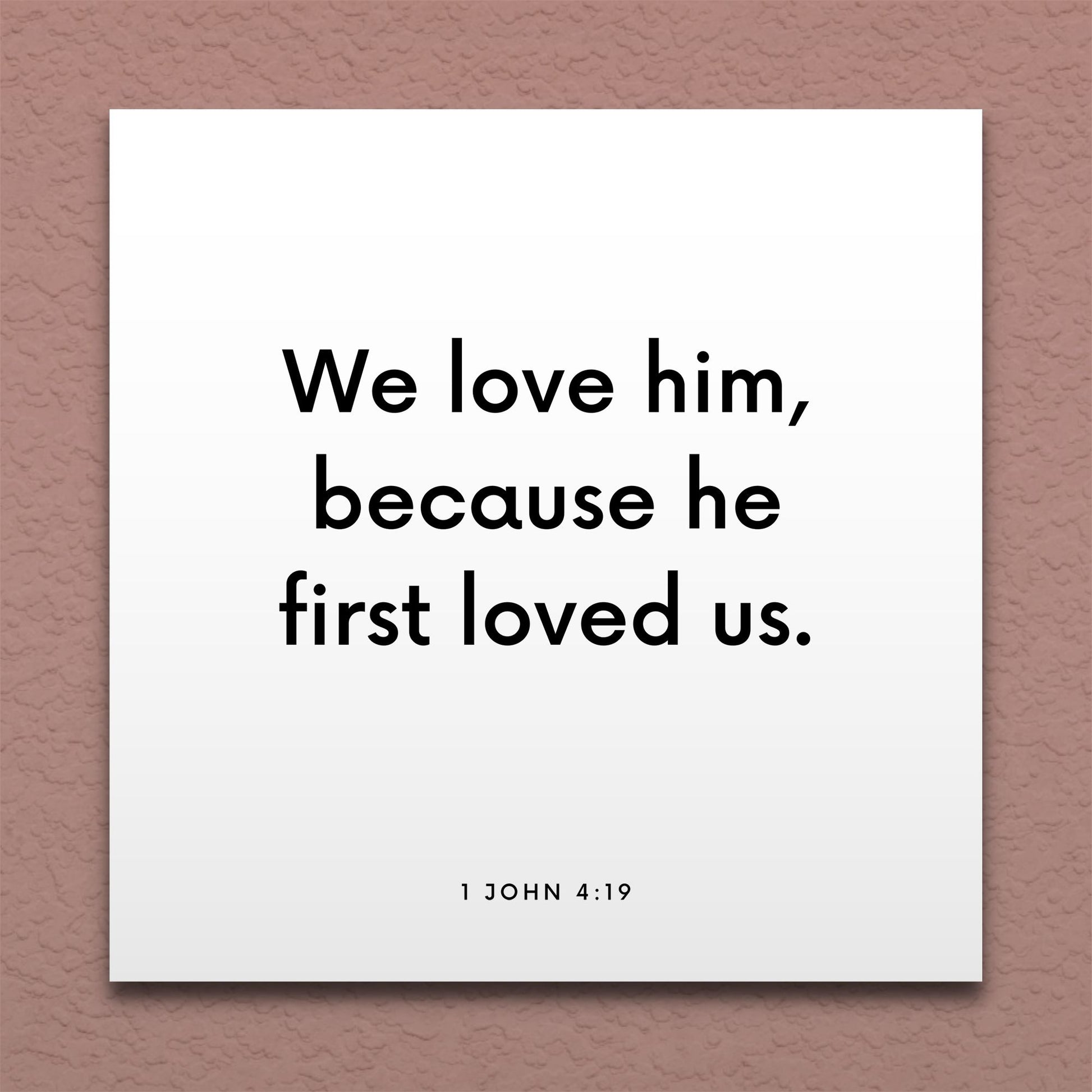 Wall-mounted scripture tile for 1 John 4:19 - "We love him, because he first loved us"